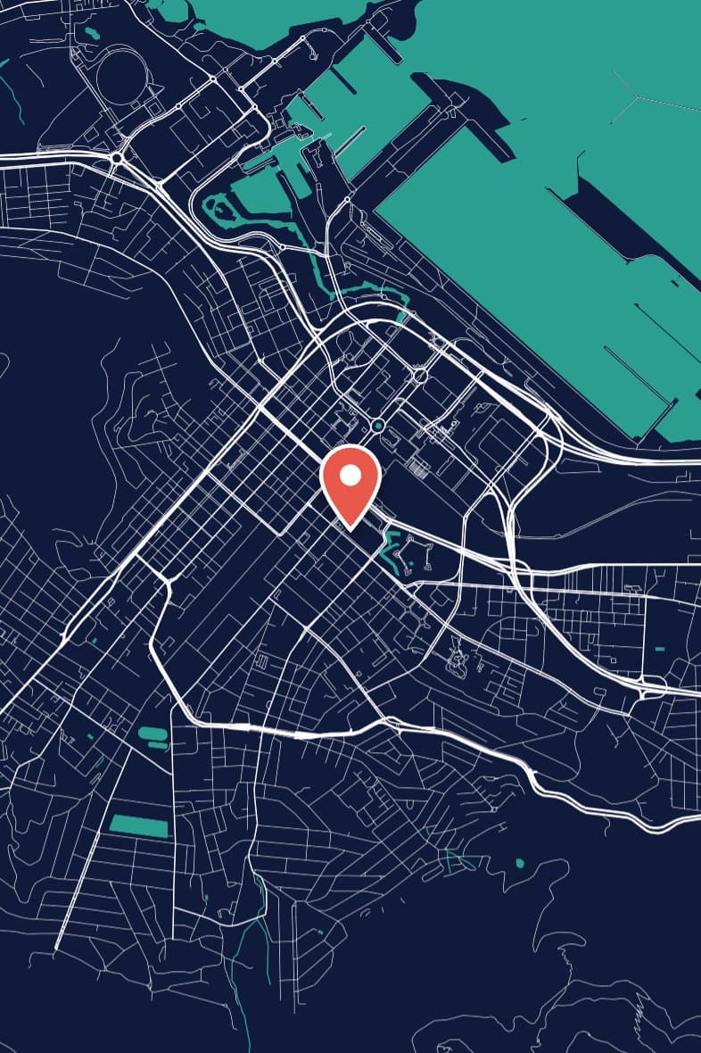 Central Cape Town's streets drawn in white on navy, with the harbour in teal and a red pin.
