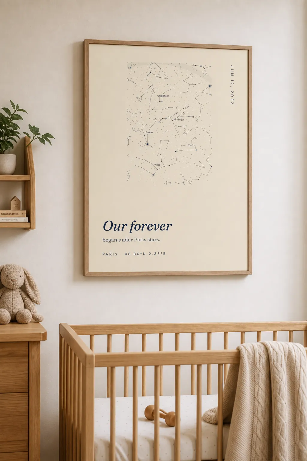 A framed SkyWhen star map print on a nursery wall above a crib