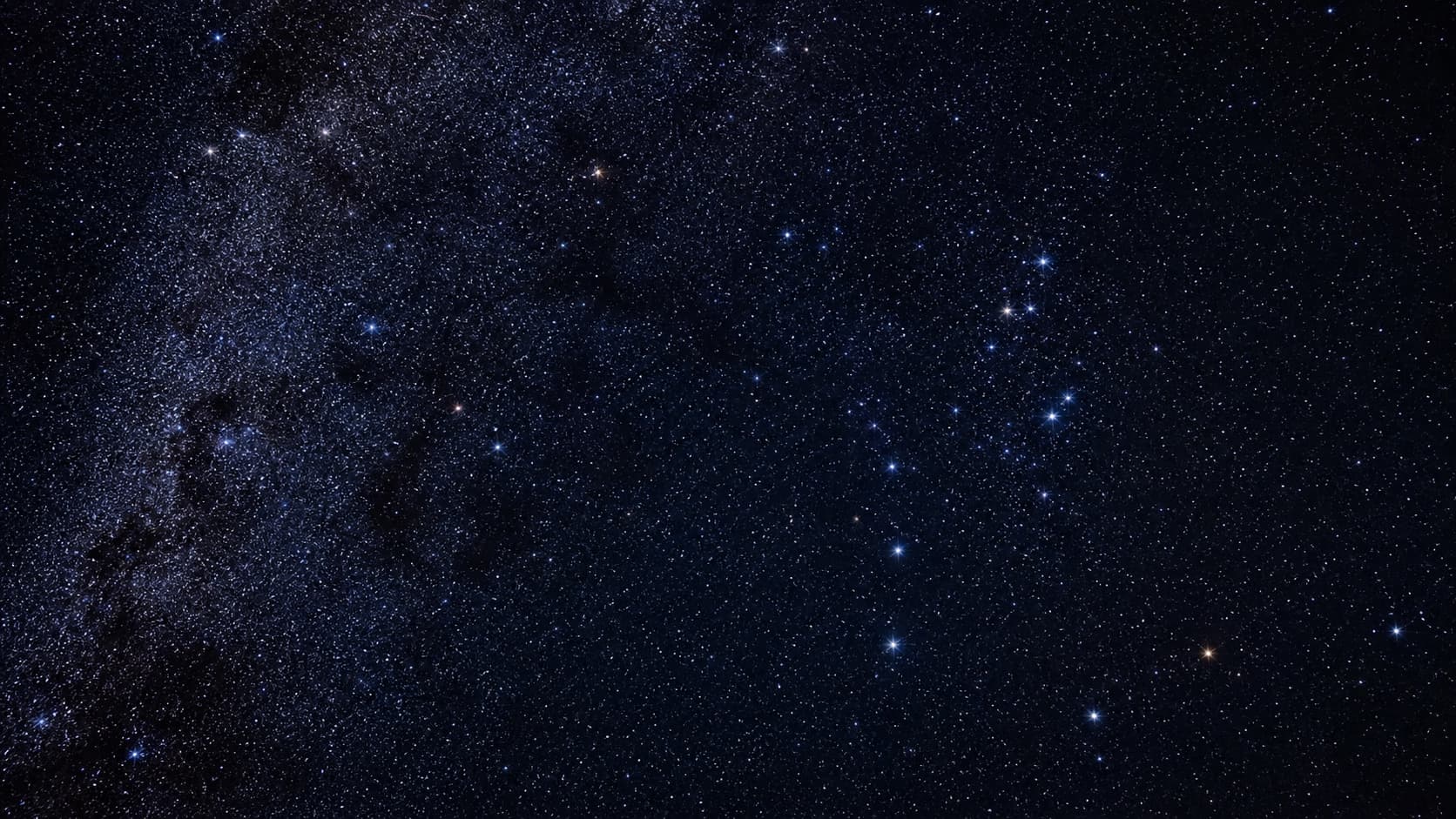 A wide field of stars and constellation patterns across the night sky.